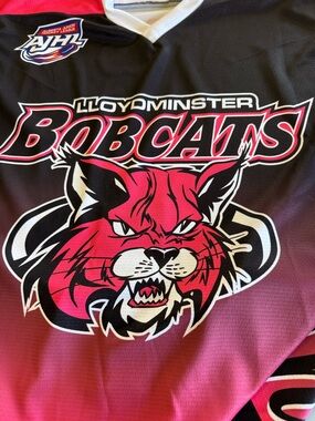 Lloydminster Bobcats Pink & Black Hockey Jersey Berreth signed, game used
